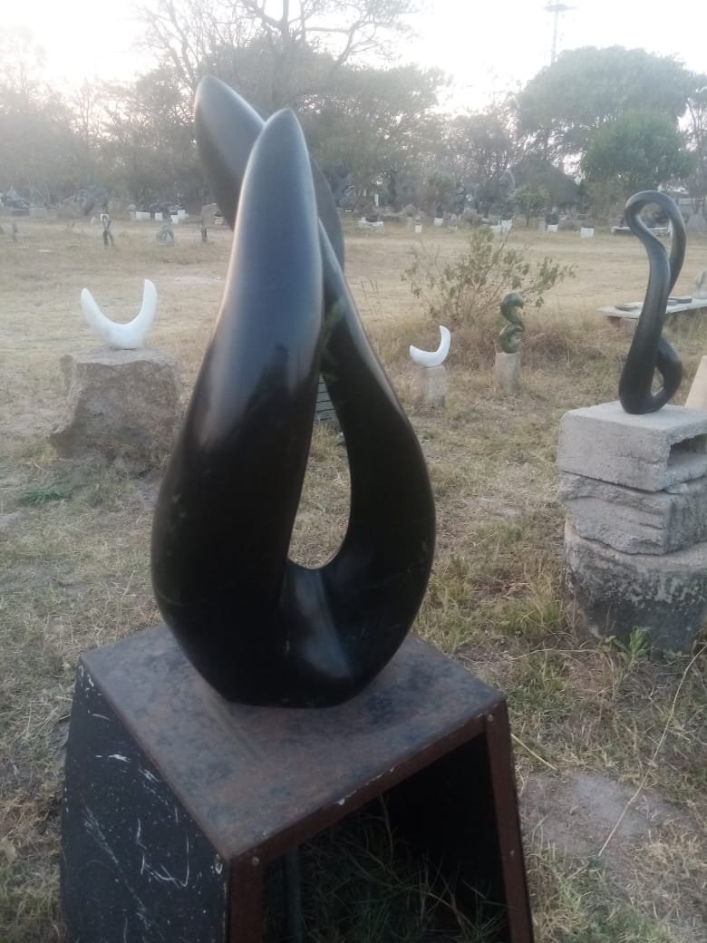 Lovers Delight - Stone Sculpture Made of Leopad Rock by Livingstone Matambo | Zimbabwe