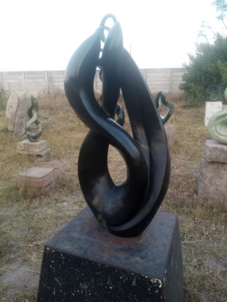 Lovers Delight - Stone Sculpture Made of Leopad Rock by Livingstone Matambo | Zimbabwe