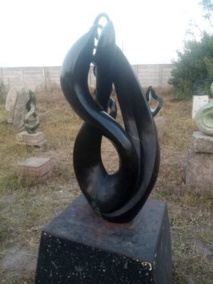Lovers Delight - Stone Sculpture Made of Leopad Rock by Livingstone Matambo | Zimbabwe
