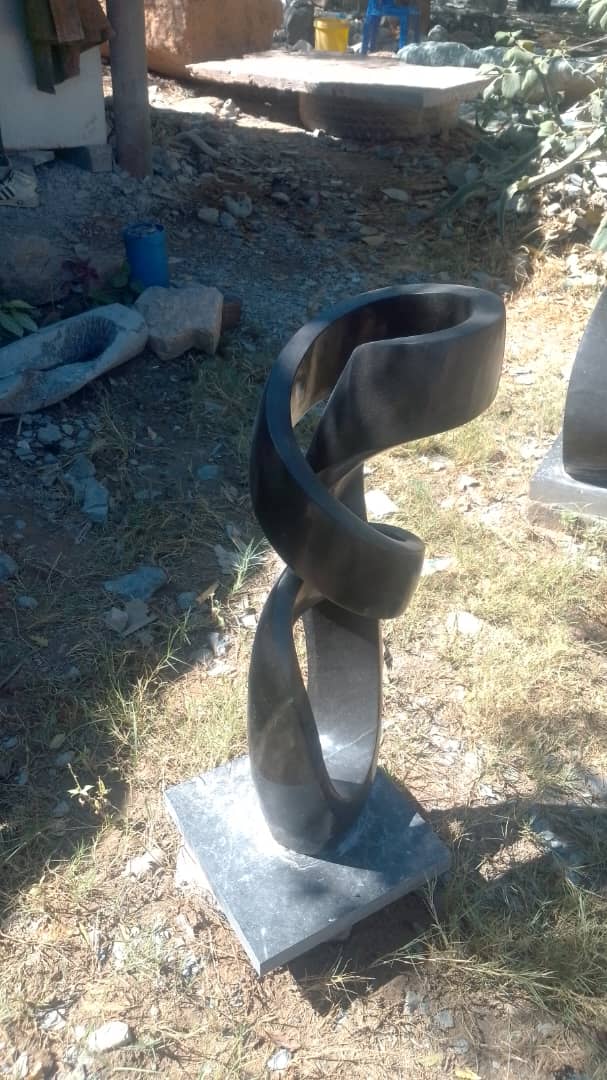 Model(Abstract) - Stone Sculpture Made of Springstone by Marshall Mangwere | Zimbabwe
