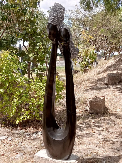 Lean on Me - Stone Sculpture Made of Springstone by Morgan Chijumani | Zimbabwe