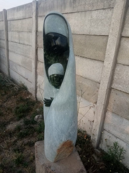 Wrapped in Care - Stone Sculpture Made of Green Opal by Lacknos Chingwaru | Zimbabwe