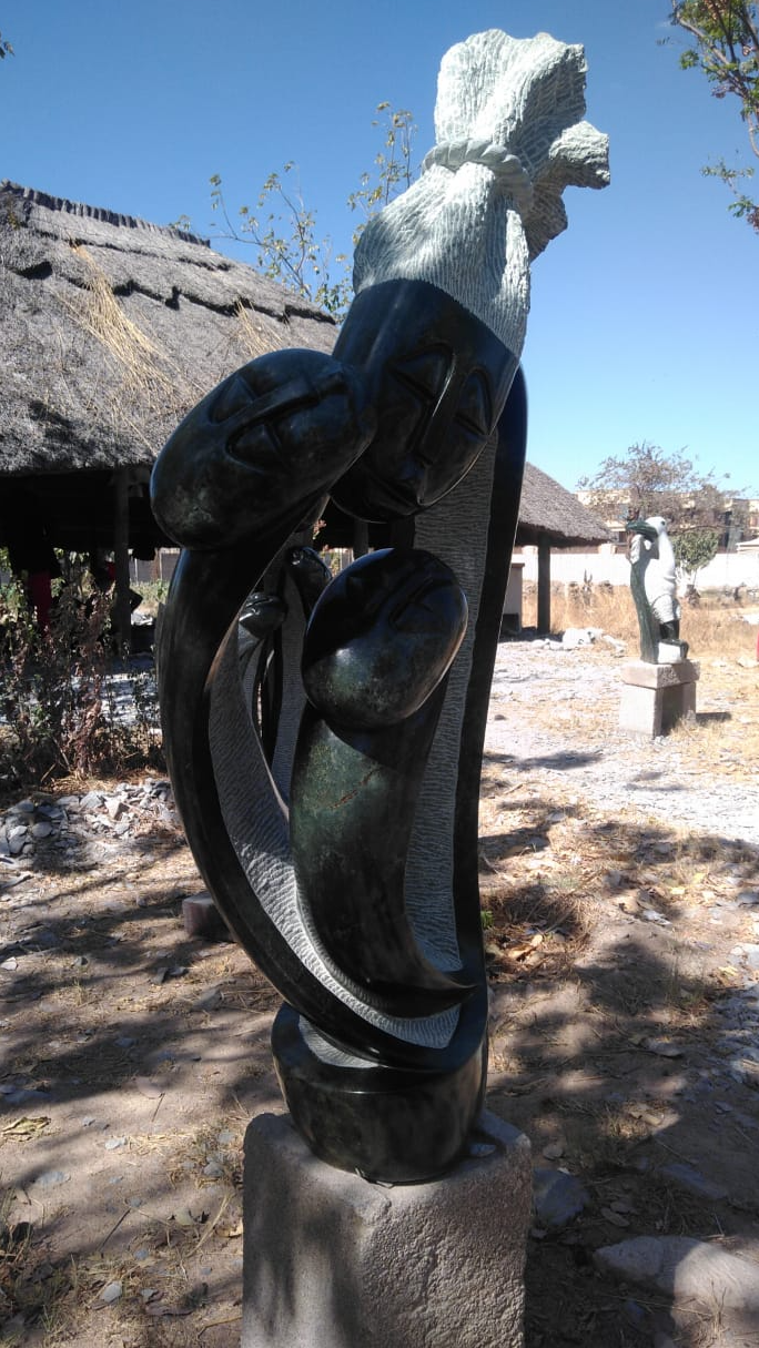 Mother & Her Twins - Stone Sculpture Made of Opal Stone by Alfred Mutuke | Zimbabwe