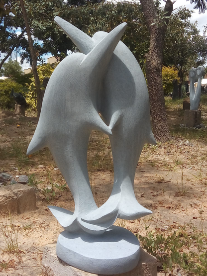 Happy Times - Stone Sculpture Made of Springstone by Morgan Chijumani | Zimbabwe