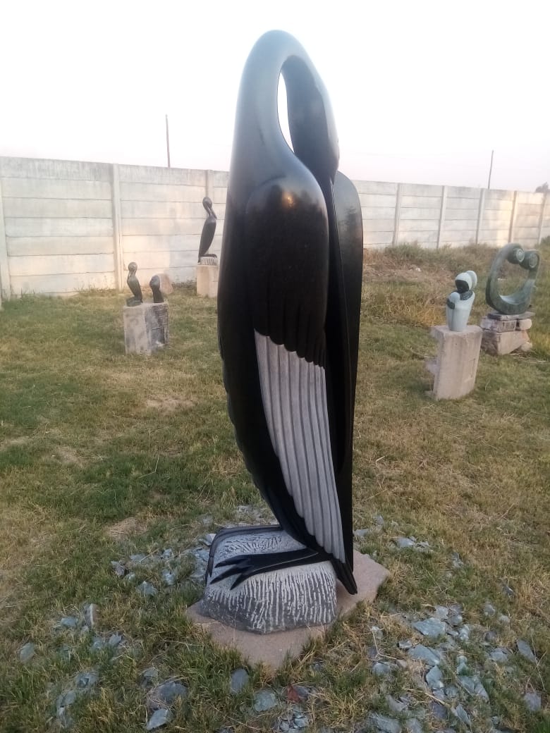 Preening Bird - Stone Sculpture Made of Springstone by Lacknos Chingwaru | Zimbabwe