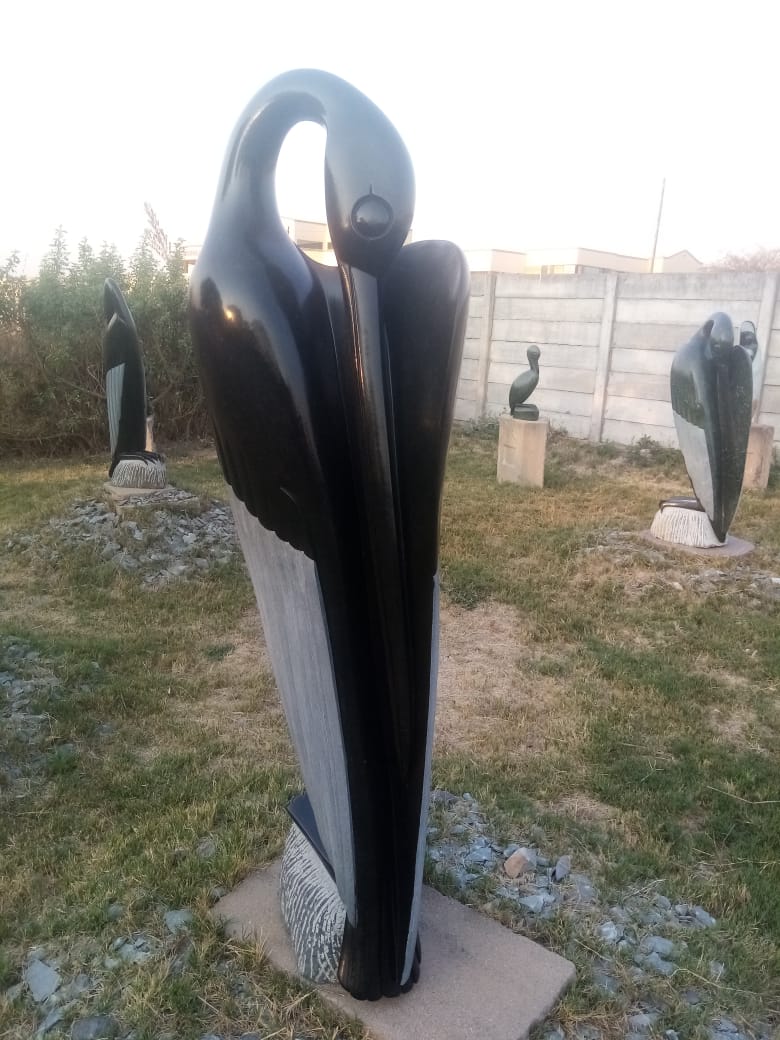 Preening Bird - Stone Sculpture Made of Springstone by Lacknos Chingwaru | Zimbabwe