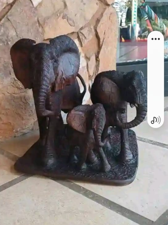 Pride of Elephants - Carved from Ironwood by Killian Torovasei | Zimbabwe