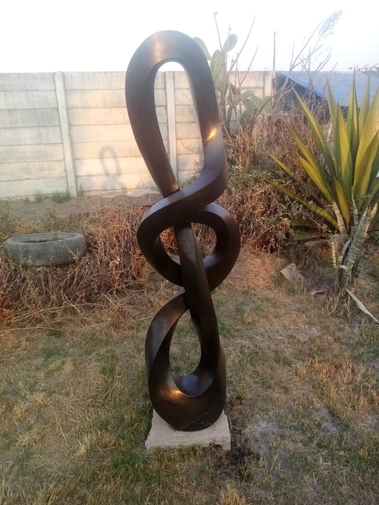 Silent Strength - Stone Sculpture Made of Springstone by Blessng Mutukwa | Zimbabwe