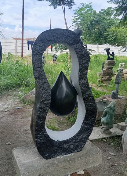 Trapped Moment - Stone Sculpture Made of Springstone by Owen Mlungisi | Zimbabwe
