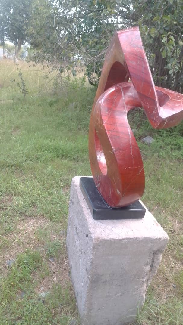 Slip Away - Stone Sculpture Made of Red Jasper by Gift Mutsahuni | Zimbabwe