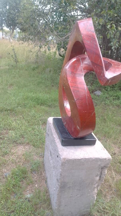 Slip Away - Stone Sculpture Made of Red Jasper by Gift Mutsahuni | Zimbabwe