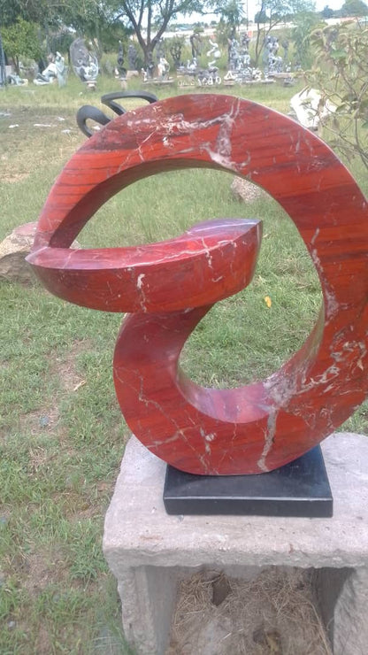 Slip Away - Stone Sculpture Made of Red Jasper by Gift Mutsahuni | Zimbabwe