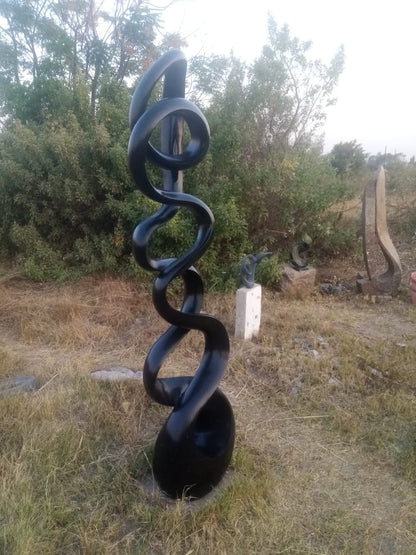 Whispers of the Past - Stone Sculpture Made of Springstone by Livingstone Matambo | Zimbabwe