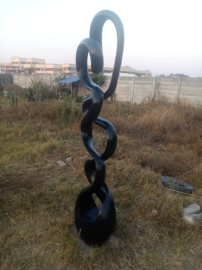 Whispers of the Past - Stone Sculpture Made of Springstone by Livingstone Matambo | Zimbabwe