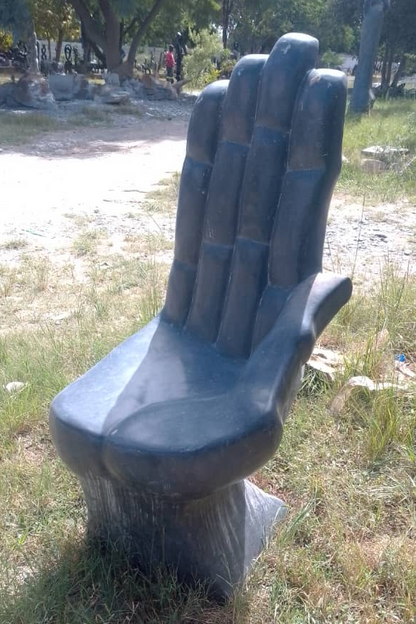 The Living Chair - Stone Sculpture Made of Springstone by Tizirai Gumbere | Zimbabwe