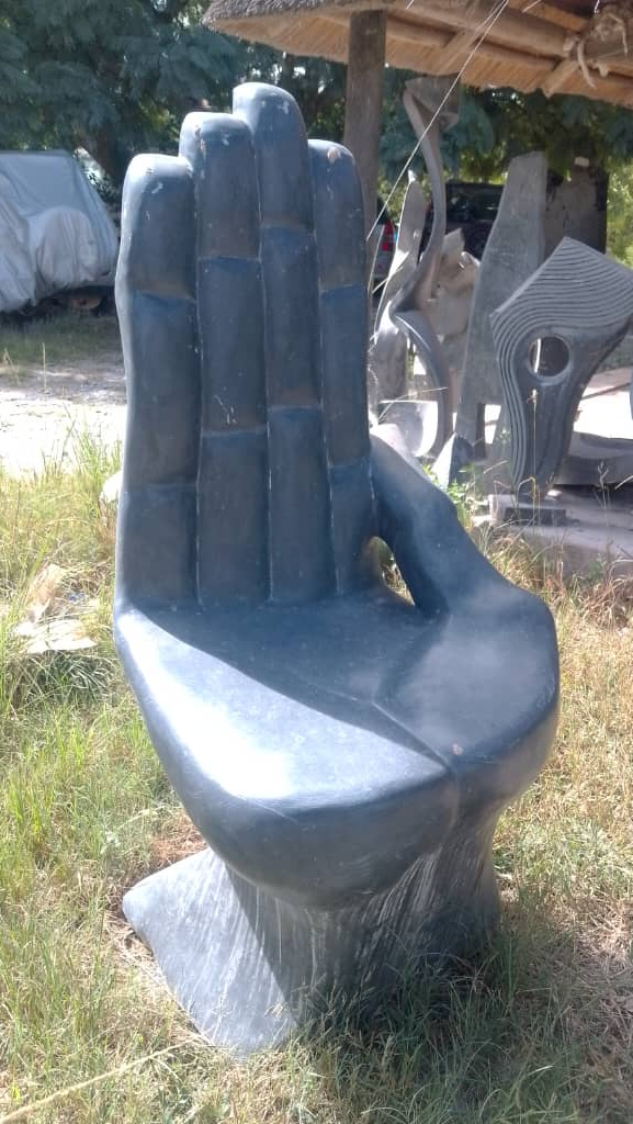 The Living Chair - Stone Sculpture Made of Springstone by Tizirai Gumbere | Zimbabwe