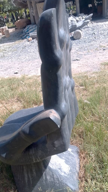 The Living Chair - Stone Sculpture Made of Springstone by Tizirai Gumbere | Zimbabwe