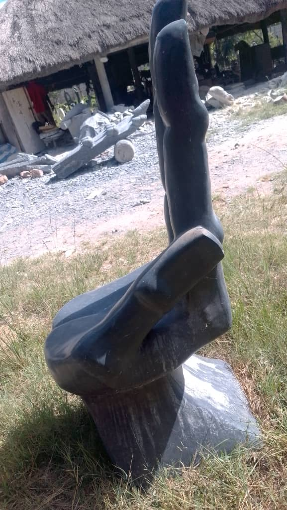 The Living Chair - Stone Sculpture Made of Springstone by Tizirai Gumbere | Zimbabwe