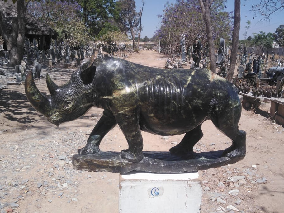 Rhino - Stone Sculpture Made of Leopard Rock by Rony Nyamhunga | Zimbabwe