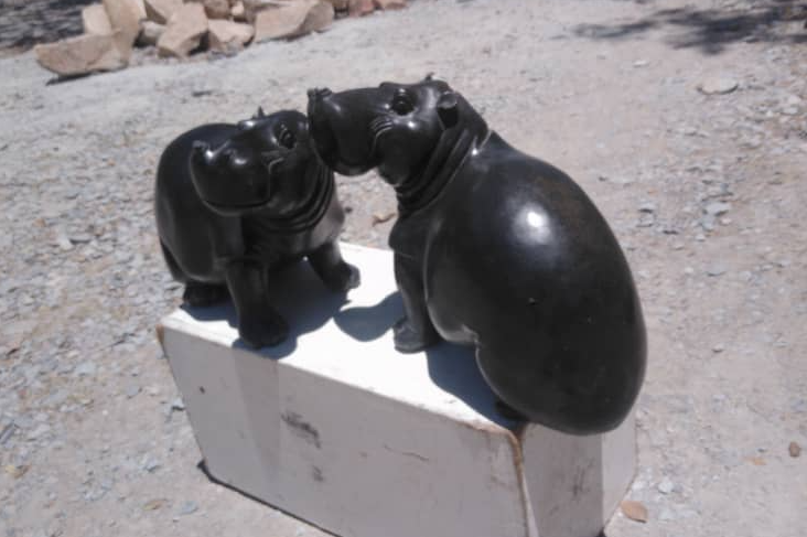 Two Hippos - Stone Sculpture Made of Springstone by Timothy Rukodzi | Zimbabwe