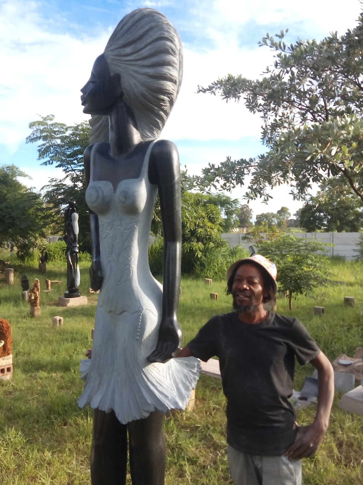 Super Model - Stone Sculpture Made of Springstone by Rufaro Murenza | Zimbabwe