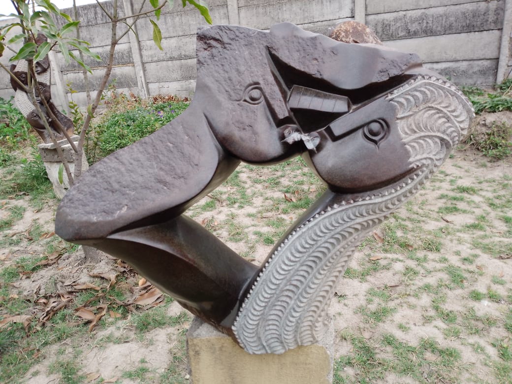 Social Distancing - Stone Sculpture Made of Brown Serpentine Rock by Eckel Nyamhondoro | Zimbabwe