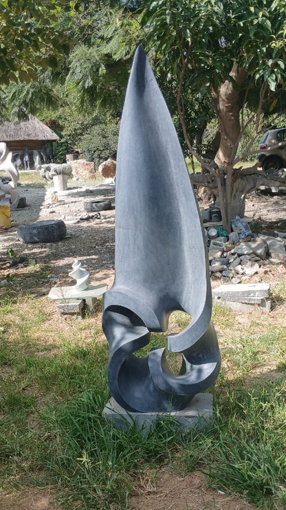 Another Shooting Star - Stone Sculpture Made of Springstone by Owen Mlungisi | Zimbabwe