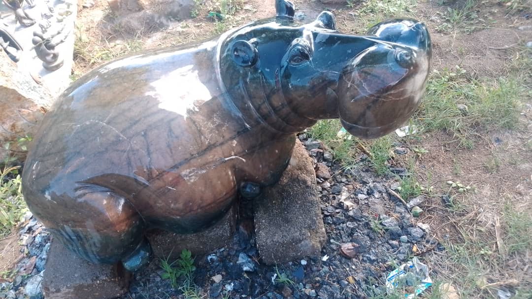 Sleeping Hippo - Stone Sculpture Made of Fruit Serpentine by Alec Kambiri | Zimbabwe