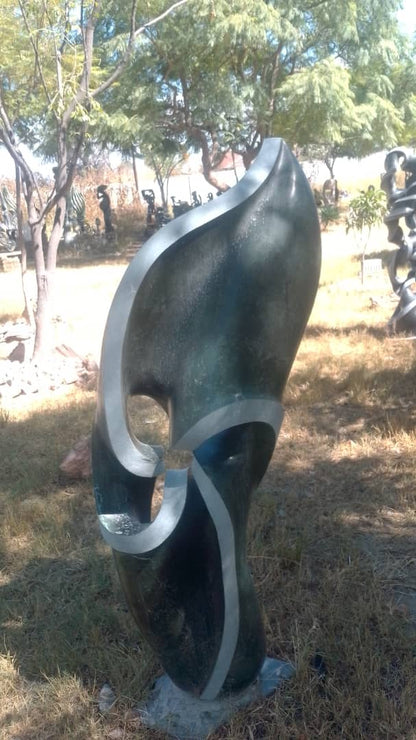 Focul Point - Stone Sculpture Made of Springstone by Davis Sibanda | Zimbabwe