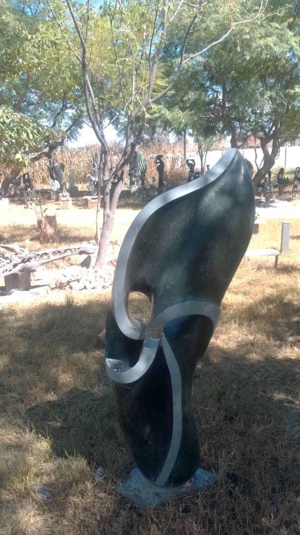 Focul Point - Stone Sculpture Made of Springstone by Davis Sibanda | Zimbabwe