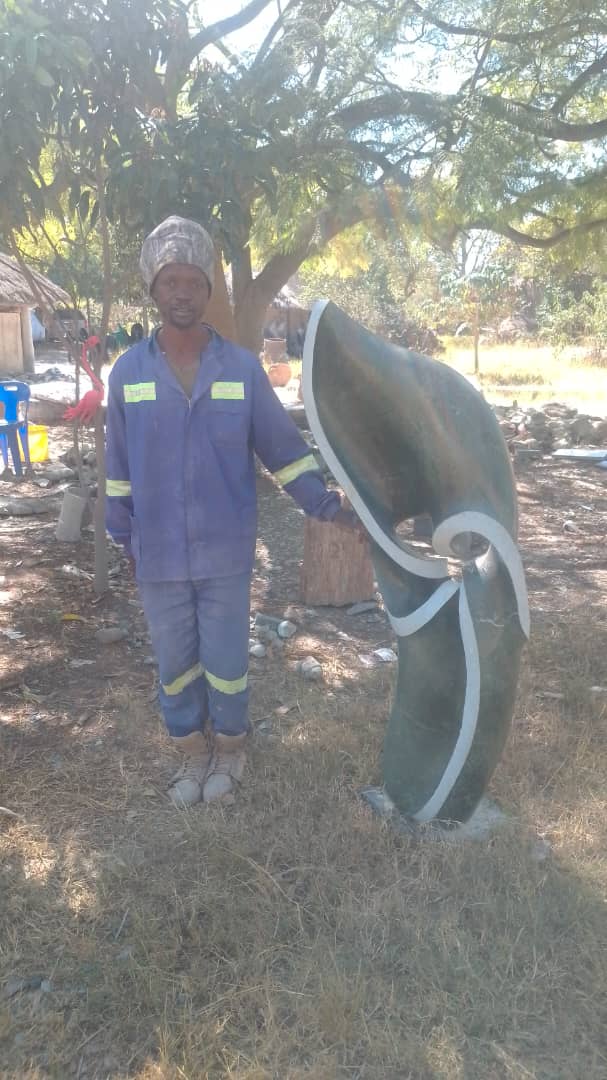 Focul Point - Stone Sculpture Made of Springstone by Davis Sibanda | Zimbabwe