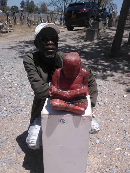 Study Time - Stone Sculpture Made of Red Jasper by Jonathan Mhondorohuma | Zimbabwe