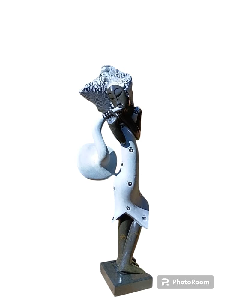 The Saxophonist - Stone Sculpture Made of Springstone by Tawanda Mashaya | Zimbabwe