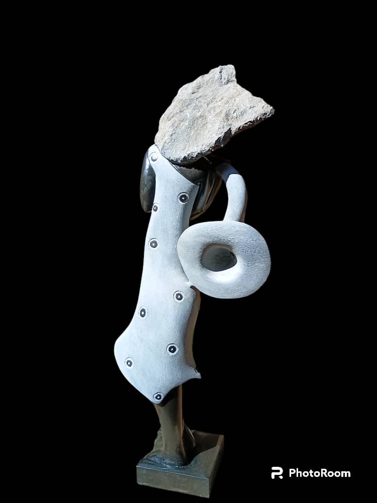 The Saxophonist - Stone Sculpture Made of Springstone by Tawanda Mashaya | Zimbabwe