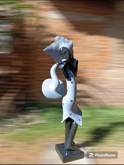 The Saxophonist - Stone Sculpture Made of Springstone by Tawanda Mashaya | Zimbabwe