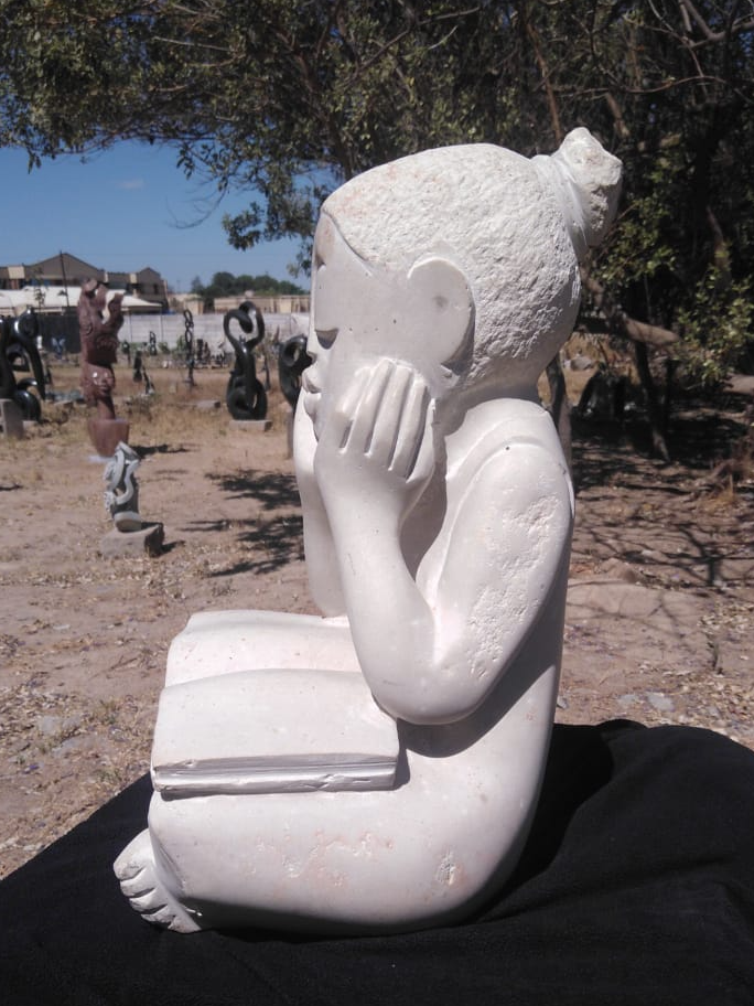 Studious Girl - Stone Sculpture Made of White Opal by Jonathan Mhondorohuma | Zimbabwe