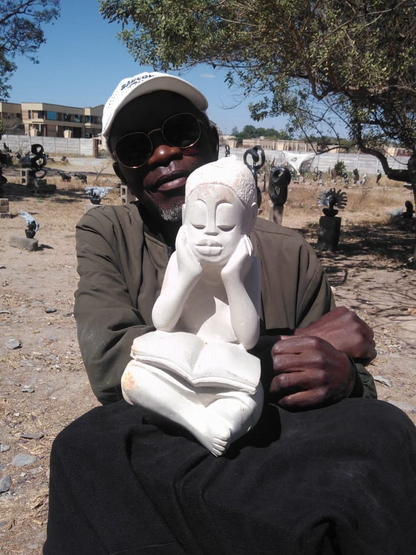 Studious Girl - Stone Sculpture Made of White Opal by Jonathan Mhondorohuma | Zimbabwe