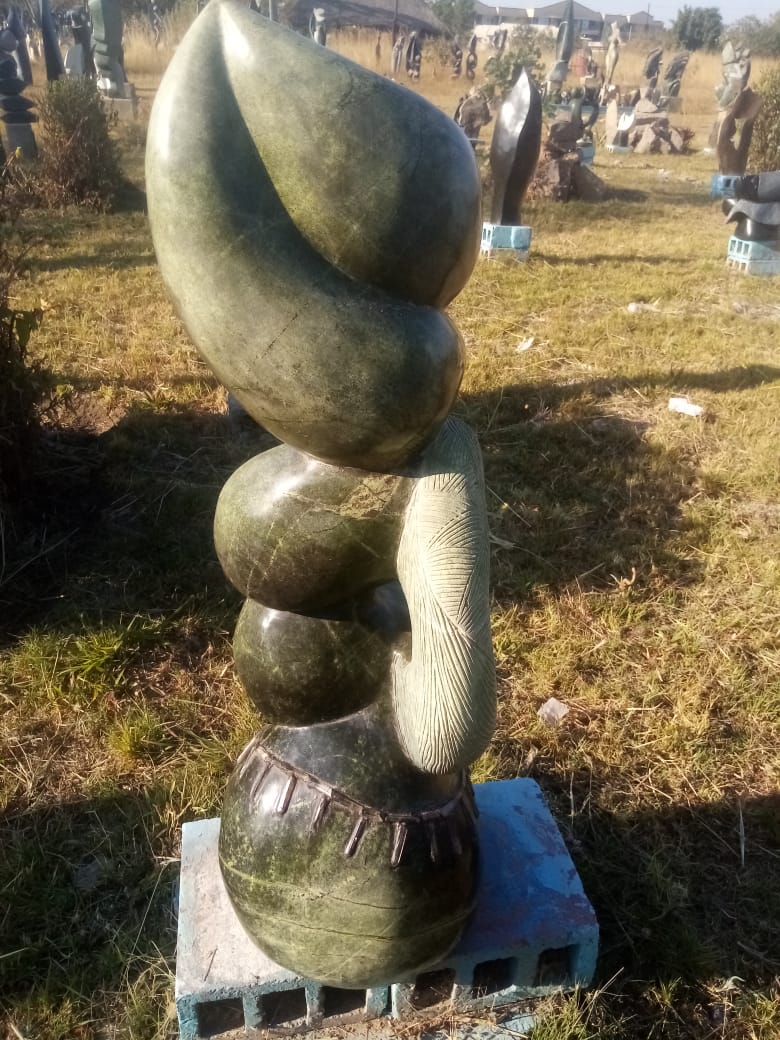 Traditional Dancers - Stone Sculpture Made of Leopard Rock by Richard Mupumha Snr | Zimbabwe