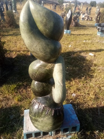 Traditional Dancers - Stone Sculpture Made of Leopard Rock by Richard Mupumha Snr | Zimbabwe