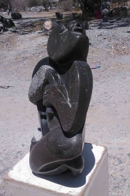 Traditional Man - Stone Sculpture Made of Fruit Stone by Lazarus Gobvu | Zimbabwe