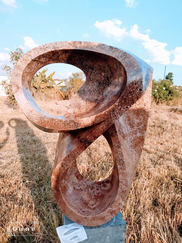 Unbreakable Bond - Stone Sculpture Made of Rose Granite by Munyaradzi Jeche | Zimbabwe