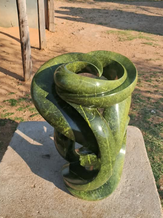 Verdant Unfurling - Abstract Stone Sculpture Made of Avocado Stone by James Phiri | Zimbabwe