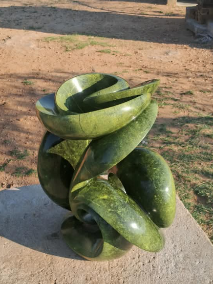 Verdant Unfurling - Abstract Stone Sculpture Made of Avocado Stone by James Phiri | Zimbabwe
