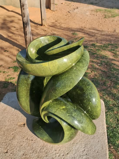 Verdant Unfurling - Abstract Stone Sculpture Made of Avocado Stone by James Phiri | Zimbabwe