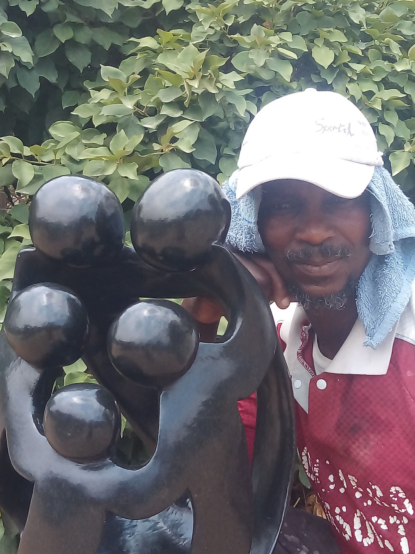 United Family - Stone Sculpture Made of Springstone by Nhota Rienda | Zimbabwe