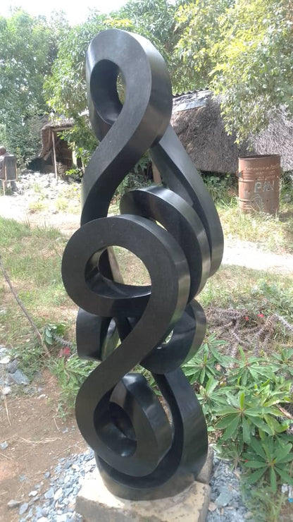 Twist of the Tide - Stone Sculpture Made of Springstone by Paul Masvikeni | Zimbabwe
