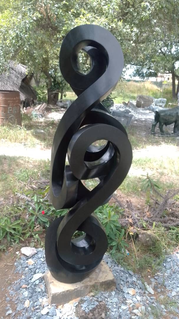 Twist of the Tide - Stone Sculpture Made of Springstone by Paul Masvikeni | Zimbabwe