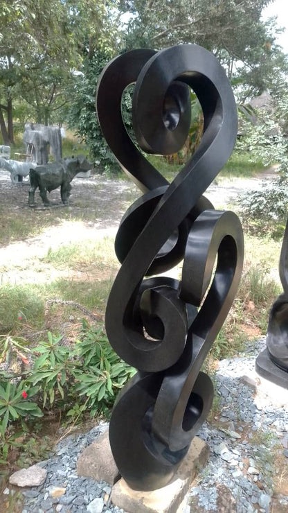 Twist of the Tide - Stone Sculpture Made of Springstone by Paul Masvikeni | Zimbabwe