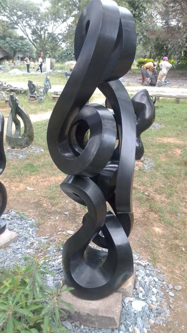 Twist of the Tide - Stone Sculpture Made of Springstone by Paul Masvikeni | Zimbabwe