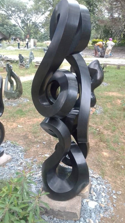 Twist of the Tide - Stone Sculpture Made of Springstone by Paul Masvikeni | Zimbabwe